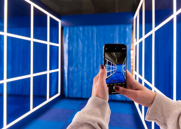A woman clicking a picture of the pop-up