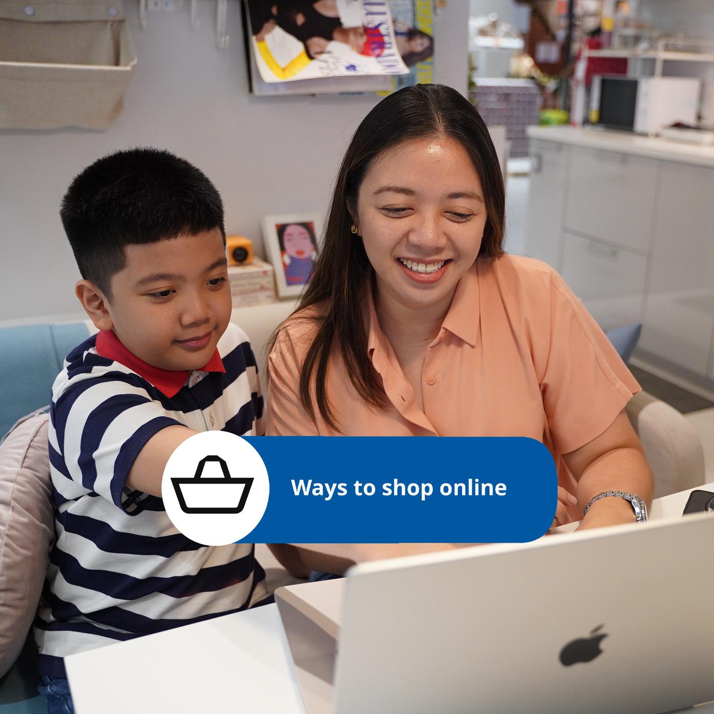 A woman helps a child shop online using a laptop, with a graphic overlay that says "Ways to shop online." A modern, cozy kitchen is visible.