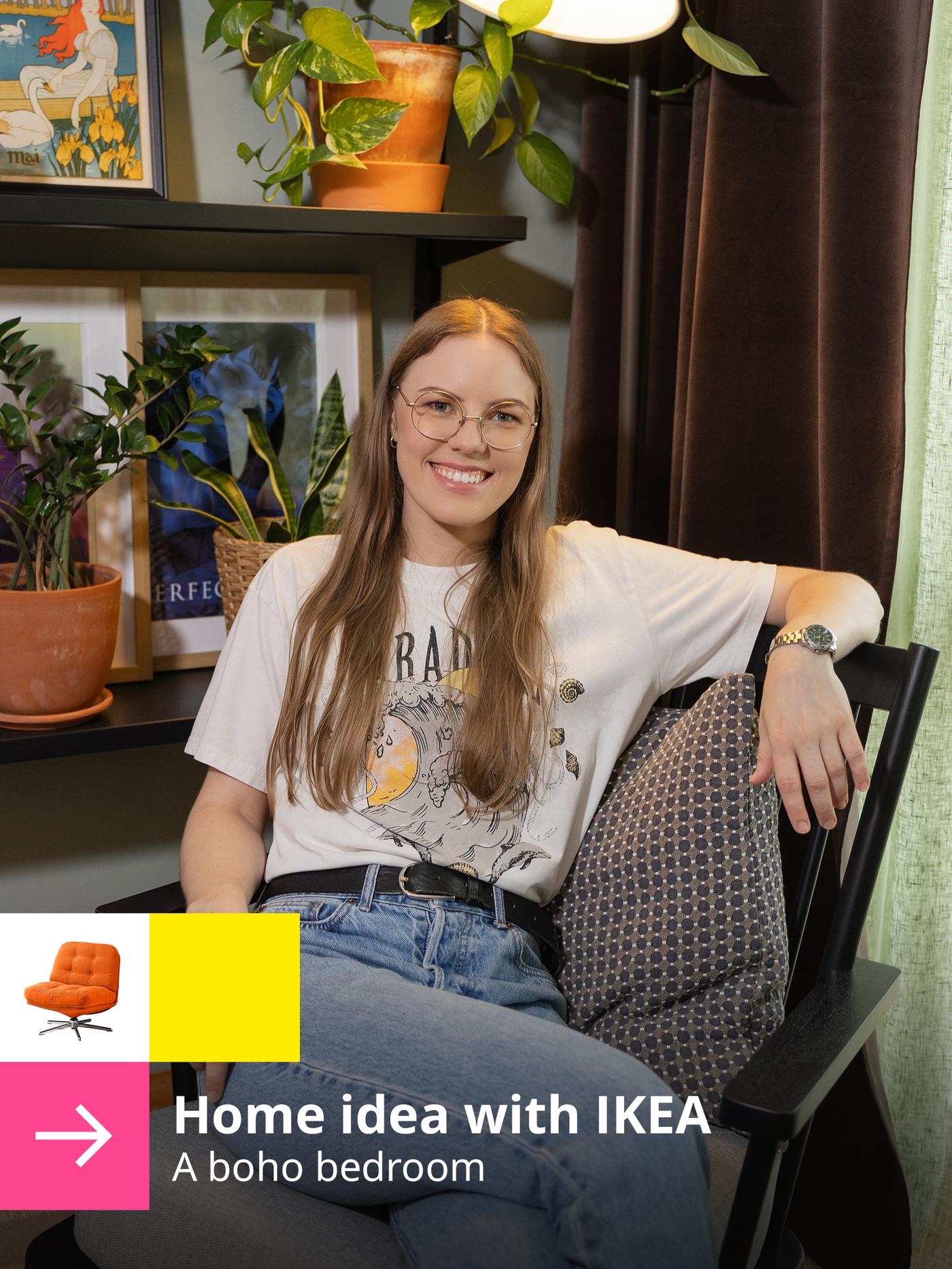 A woman is sitting on a chair in a bedroom, smiling, with framed artwork and plants behind her. Text in the bottom-left corner reads: “Home idea with IKEA: a boho bedroom”.