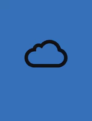 A woman with brown curly lying face down on a pillow sleeping comfortably.