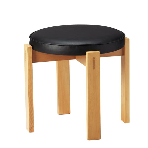 A wooden stool with a black cushion.