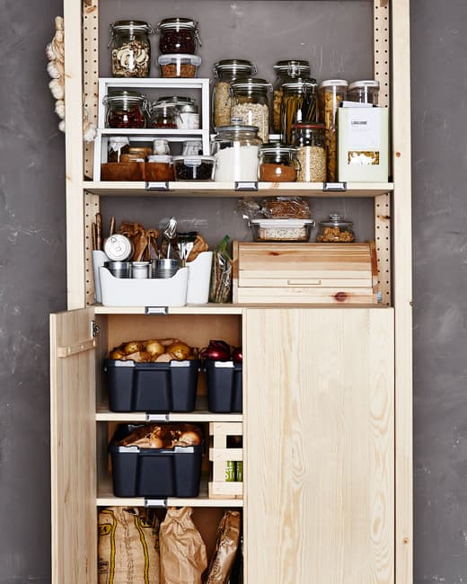 A wooden storage pantry to keep you organized in the kitchen