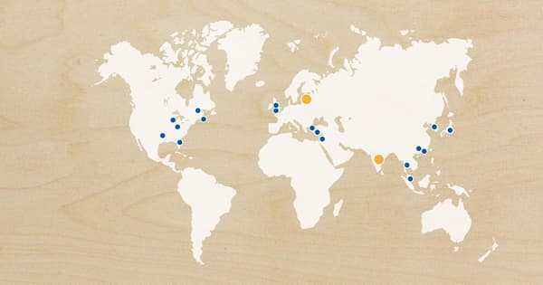 A world map showing with blue and oranged dotted locations to show IKEA store expansion and upcoming launches in 2018.