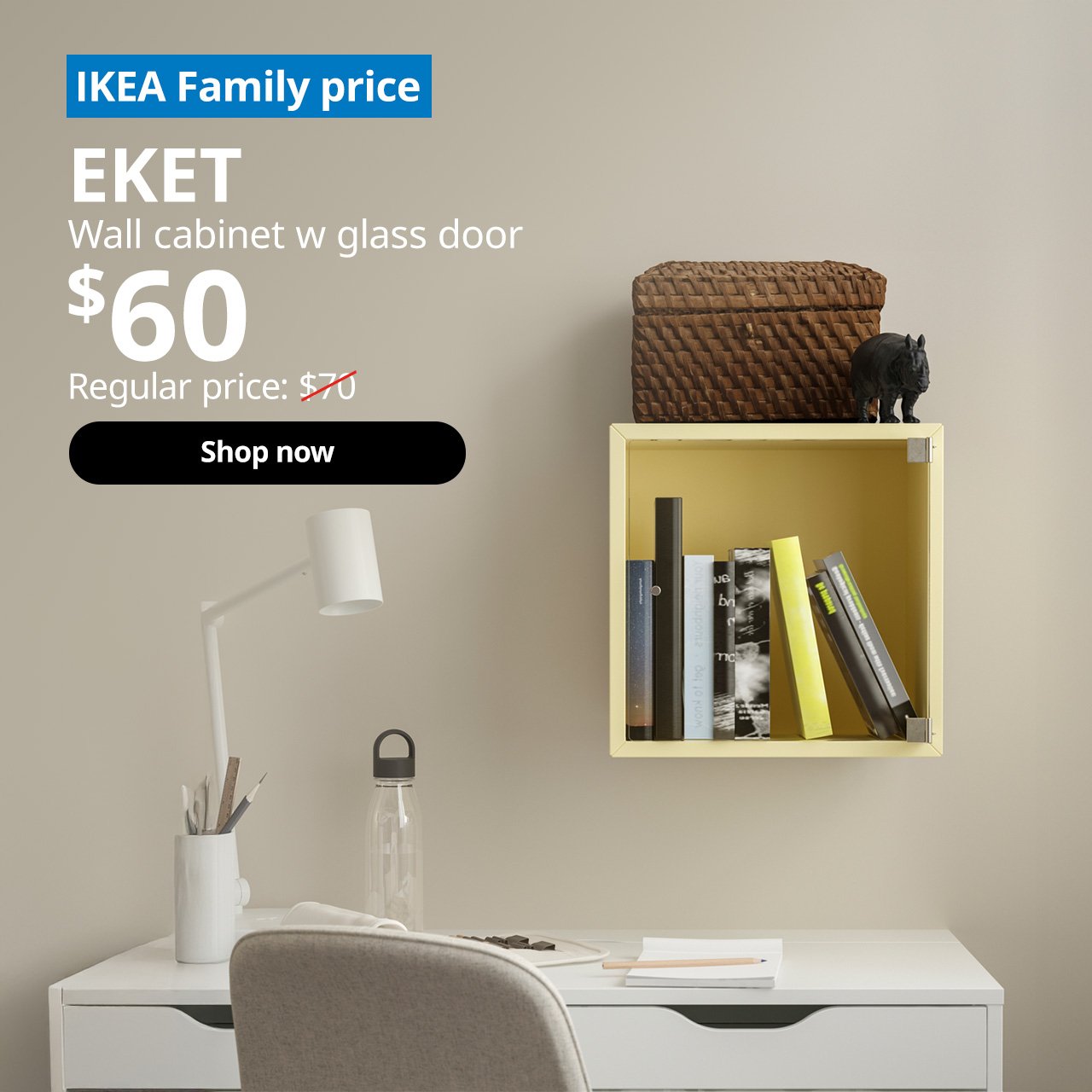 A yellow EKET wall cabinet with a glass door is mounted above an ALEX desk. A blue tag with white text that reads "IKEA Family price", followed by black text overlaying the image that reads "EKET, Wall cabinet w glass door, $60, Regular price $70".