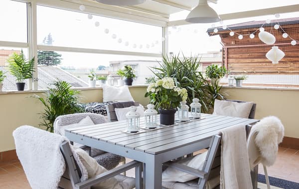 Add cushions and rugs to your outdoor space.