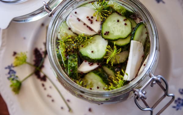 Add pickled vegetables to sandwiches.