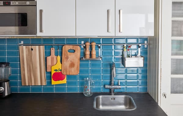Add rails for additional storage on the walls.