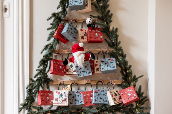 Advent calendar made out of christmas gift bags.