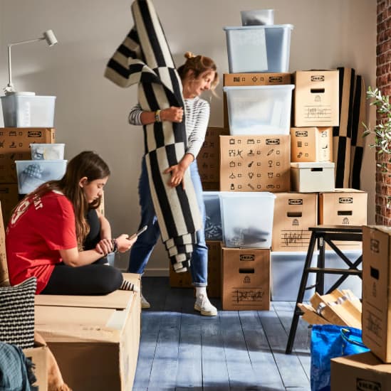 Afbeelding van mensen die aan het verhuizen zijn