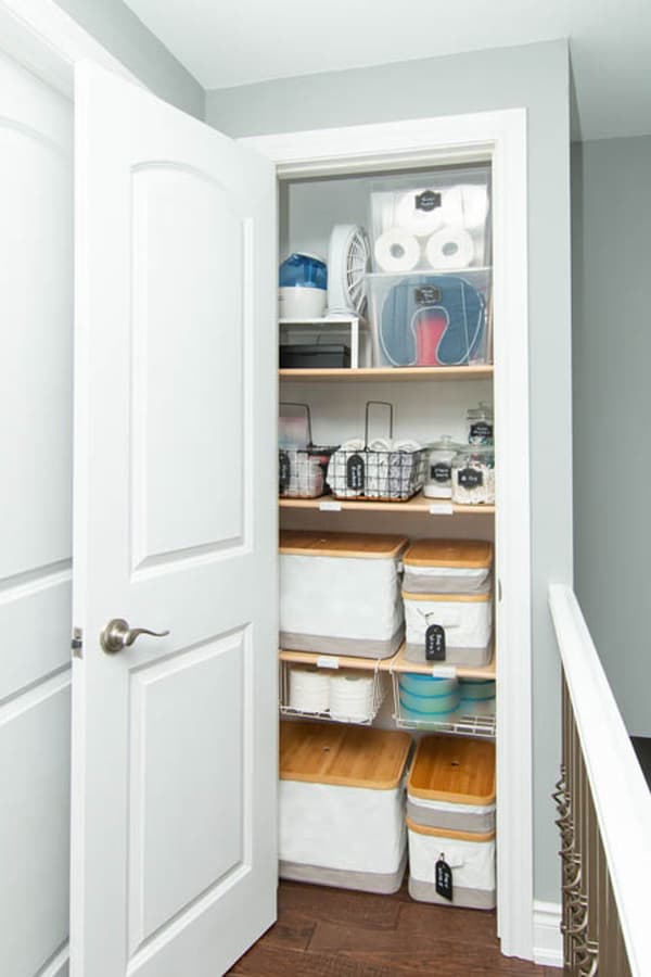 After shot of Megan's closet, with well-filled shelves and organization solutions storing various items.
