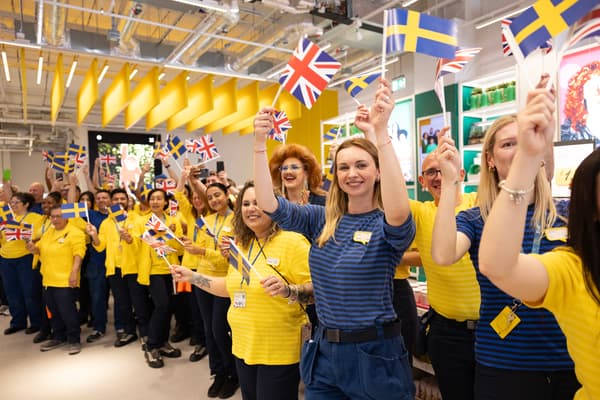 All employees waving flags