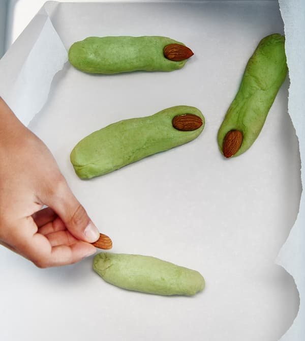  Almonds are placed on shortbreads that look like witch fingers. The nuts are “finger nails”.