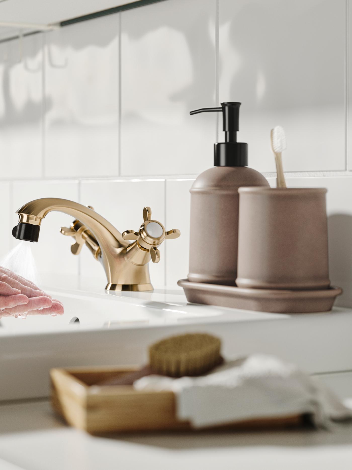 An ÅBÄCKEN mist nozzle for mixer tap