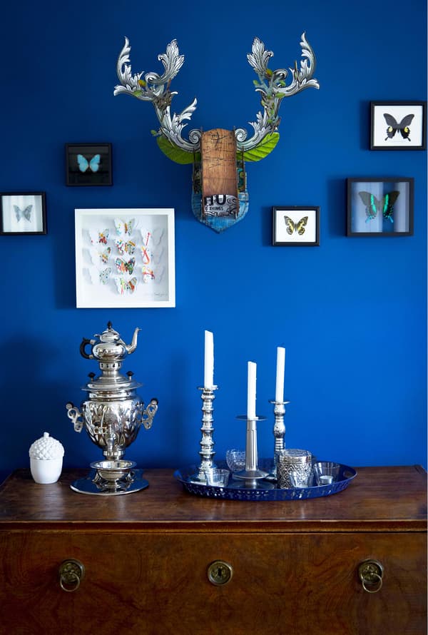An accent wall adds personality to a white room.