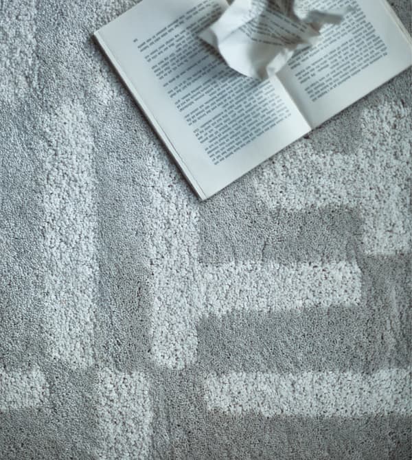 An aerial view of a plush patterned rug.