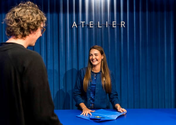 An employee smiling at the customer