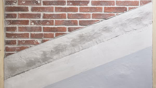 An example of different types of solid walls such as masonry, concrete and cinder block.