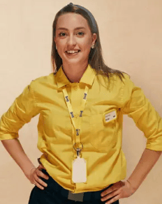 An IKEA co-worker in a yellow shirt. 