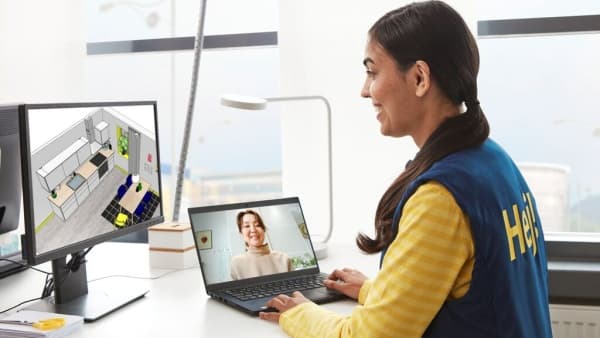 An IKEA co-worker meeting with a customer virtually to plan a kitchen design.