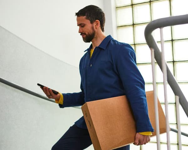 An IKEA coworker delivering an order