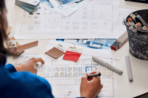 An IKEA employee is working on an interior design project for IKEA Business Network customers.