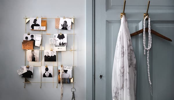 An image board beside a front door.