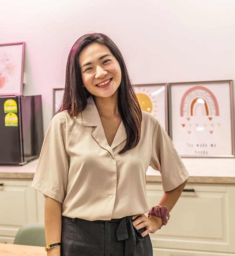 An image of a lady smilling.