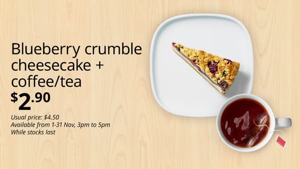 An image of Blueberry crumble cheesecake and a cup of tea. Black text over image that reads 