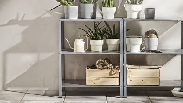 An in/outdoor HYLLIS shelving unit outside