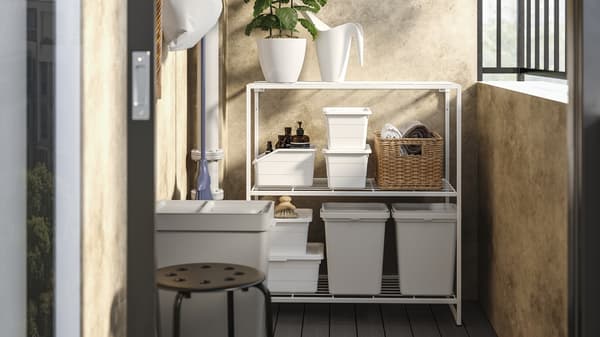 An in/outdoor/wire white JOSTEIN shelving unit outside