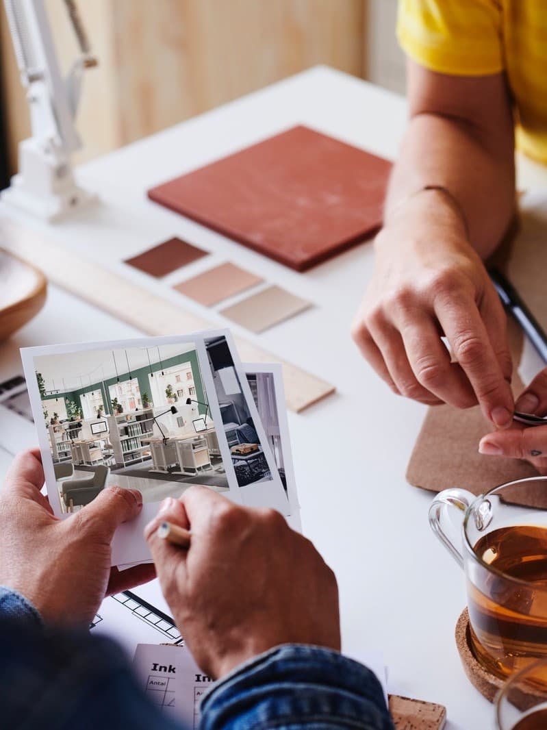 An interior design moodboard with colours, pictures.