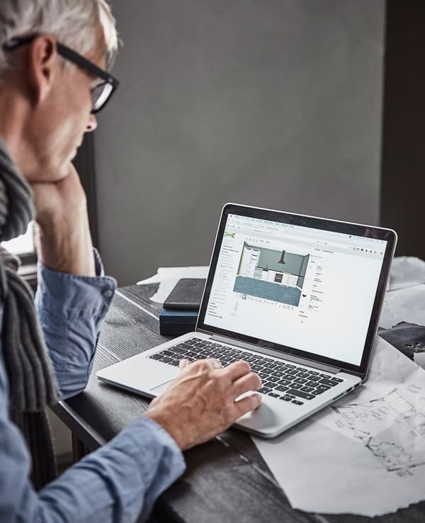 An interior stylist using an online IKEA kitchen planner