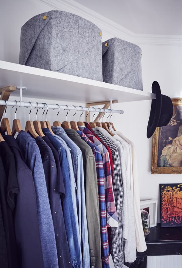 An open-storage wardrobe.