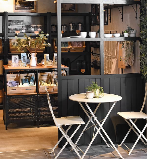 An outdoor area featuring an outdoor table and chairs.