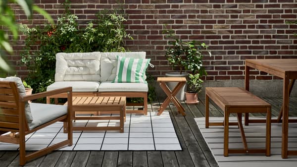 An outdoor sofa and tables from NÄMMARÖ series.