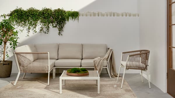 An outdoor sofa combination and chair with armrests from SEGERÖN series.