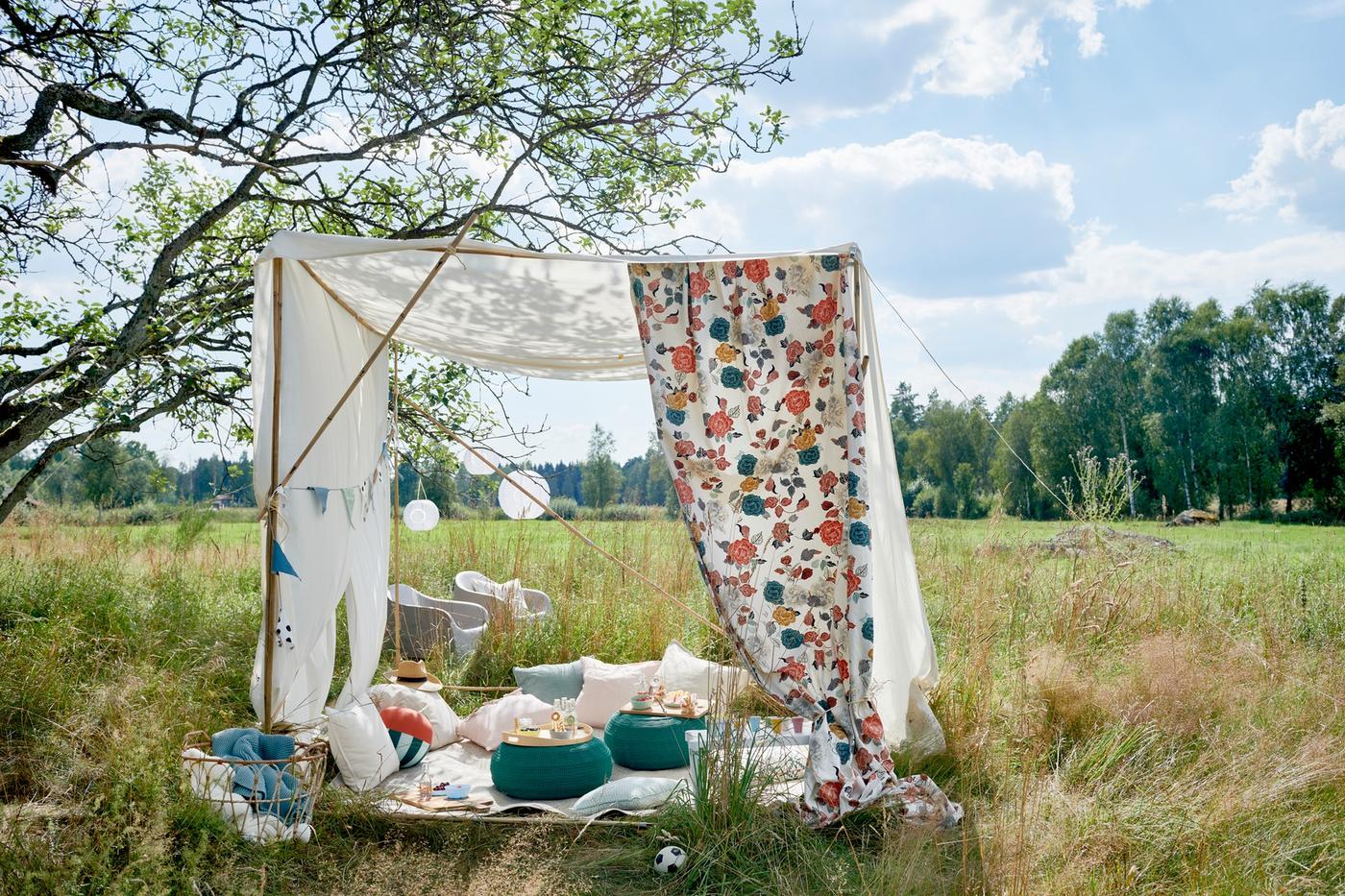 An outdoor tent adorned with TROLLMAL fabric. 