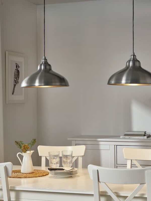 ANKARSPEL pendant lamps on top of a dining table
