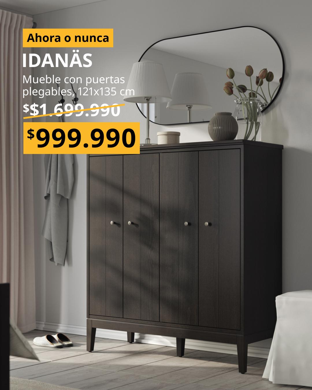 Armario IDANÄS con puertas plegables en acabado marrón oscuro teñido, que combina almacenamiento práctico y diseño clásico.