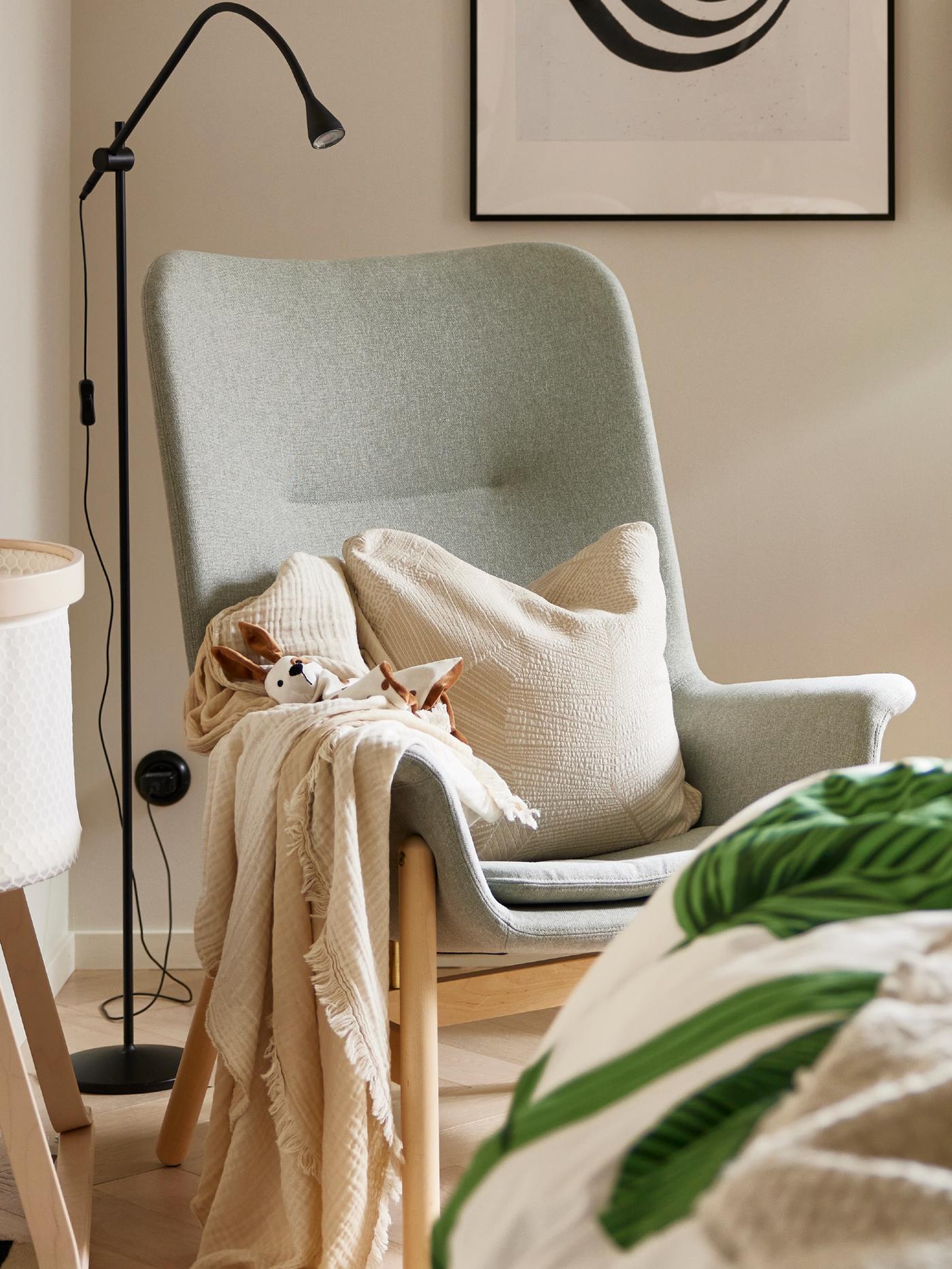 Armchair with a cushion and throw