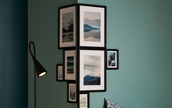 Arrange different-size frames with themed motifs tightly round a corner to create an expression like no other.