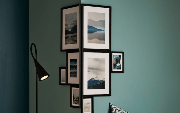 Arrange different-size frames with themed motifs tightly round a corner to create an expression like no other.