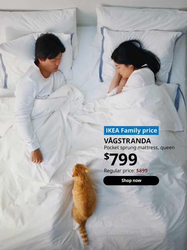 Asian woman and man sleeping on bed together, with pet cat on the duvet. VÅGSTRANDA pocket sprung mattress, extra firm, $799. Regular price: $899. Shop now.