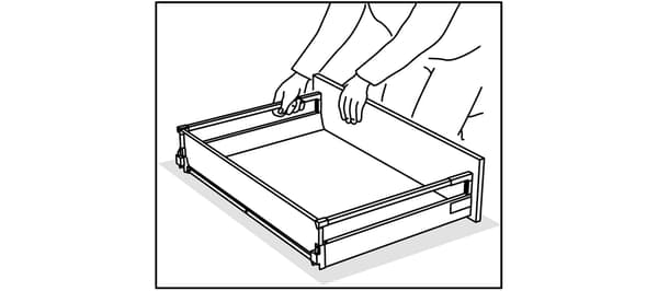 Assembling IKEA kitchen drawers.