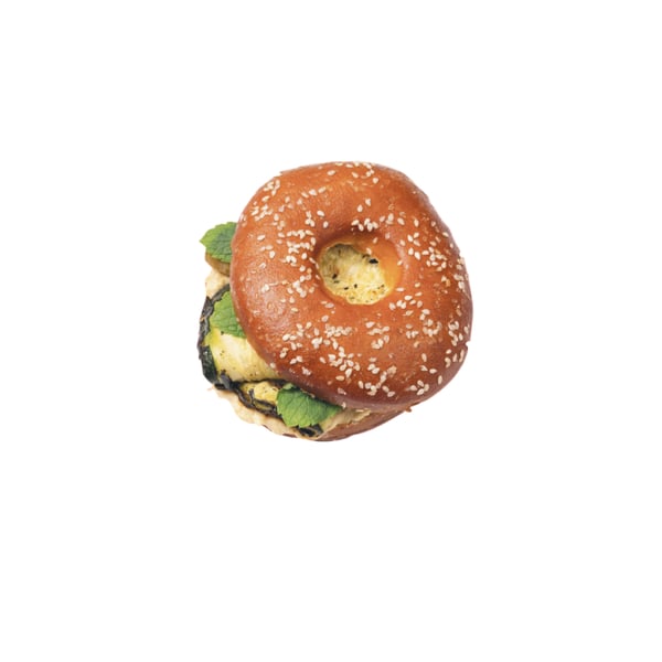 Bagel vegetariano con hummus, zucchine grigliate e menta