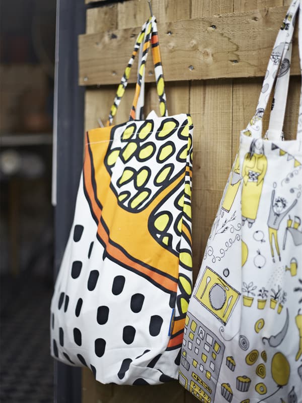 Bags hanging from hooks on the shed door