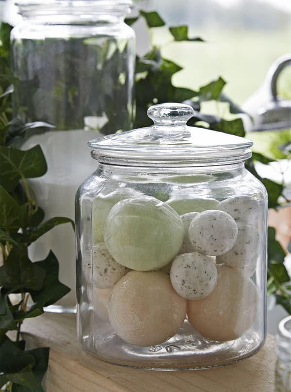 Bath salts stored in a glass jar.