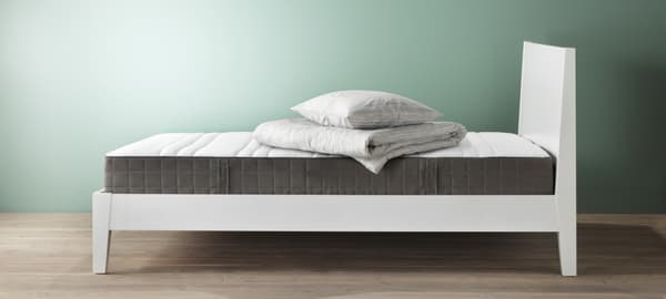 bed with green background