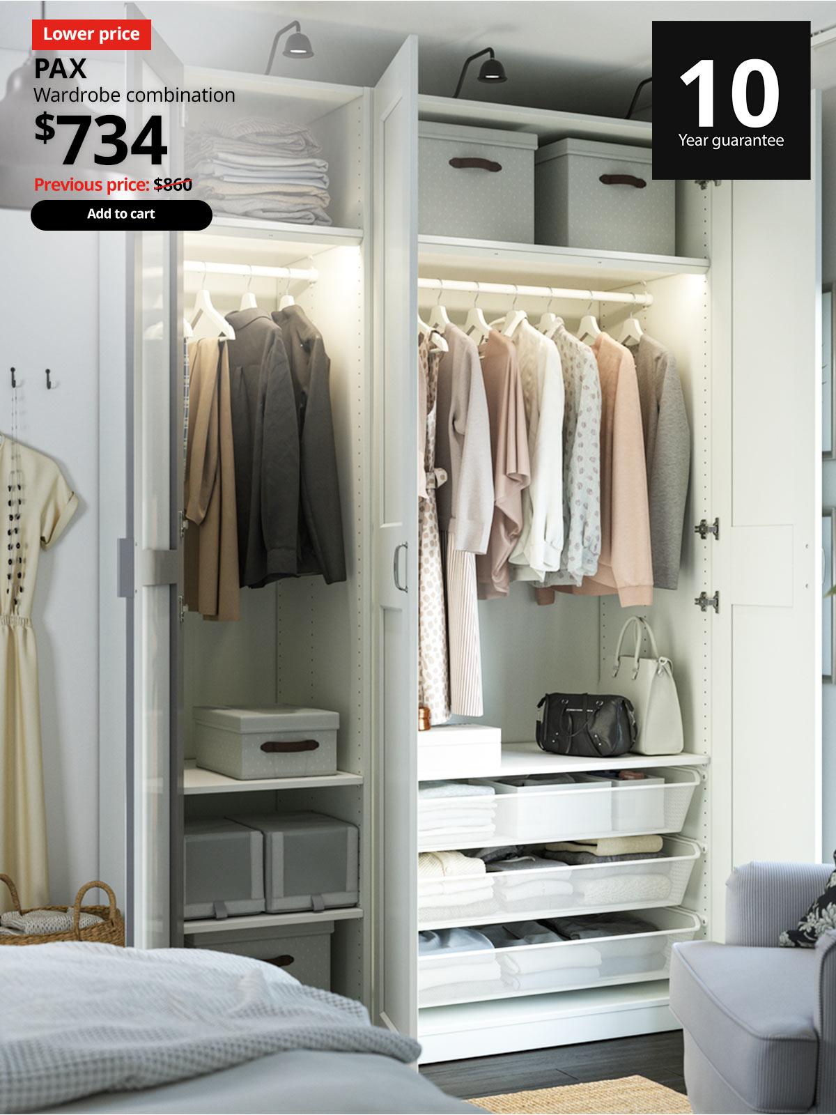Bedroom setting with PAX / KAMMARTORP/GRIMO. Wardrobe combination, white mirror glass/grey white, 150x60x236 cm. Price: $744. Previous price with red slash: $860. 10-year guarantee logo on top right hand corner.