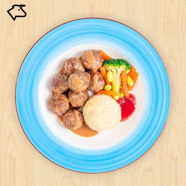 Beef meatballs with mashed potato, mixed vegetables with green soya beans, cream sauce and lingonberry jam